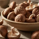 A beautifully arranged plate showcasing fresh shiitake mushrooms, highlighting the shiitake mushroom benefits for women.