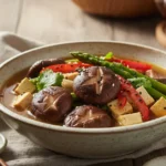 A visually appealing and healthy bowl of shiitake mushroom dishes showcasing the shiitake mushroom benefits for women.