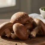 A close-up, natural light photograph showcasing fresh shiitake mushroom for diabetes management, highlighting their earthy texture and vibrant color.