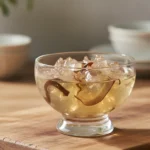 A visually appealing serving of wood ear mushroom jelly in a clear bowl, showcasing its unique texture.
